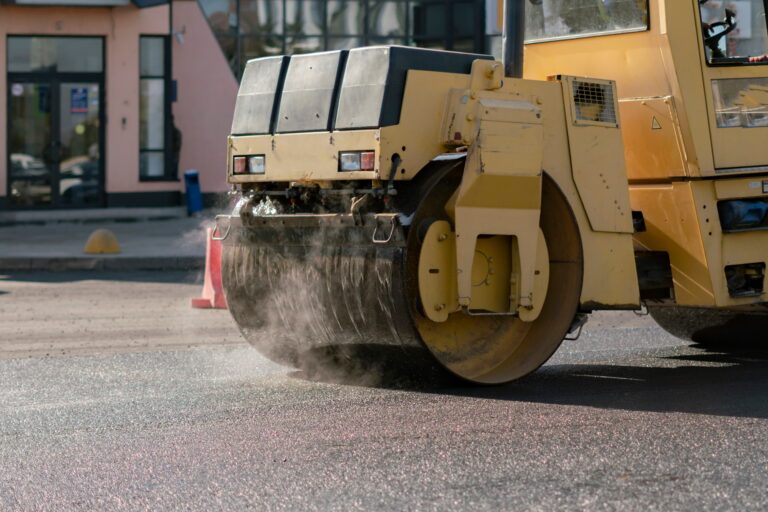 road repair process, roller vehicle fix the highway in the urban city street